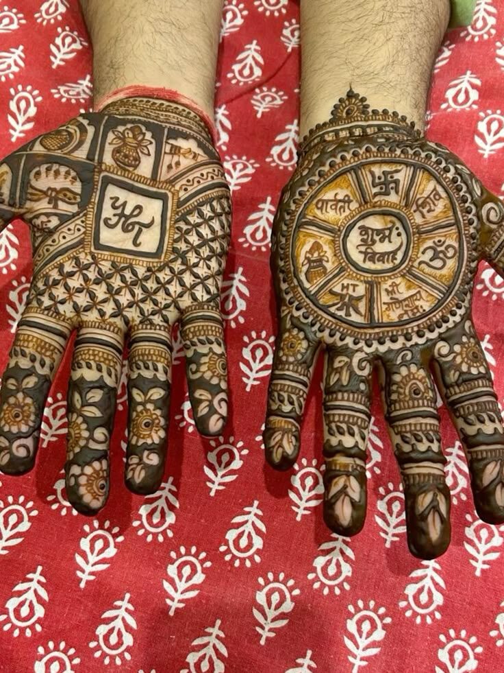 Intricate bridal palm mehandi with mandala coin design